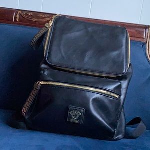 Versace bag got lot of  compliments on the bag ! Tiny scratch not noticeable!